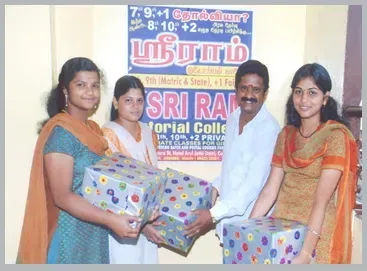 Director of Sri Ram Tutorial College Mr.Ramakrishnan distributing prizes for high scored students