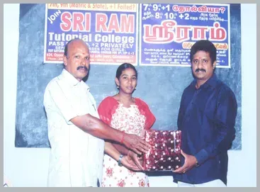 Director Mr.Ramakrishnan distributing prizes for high scored students